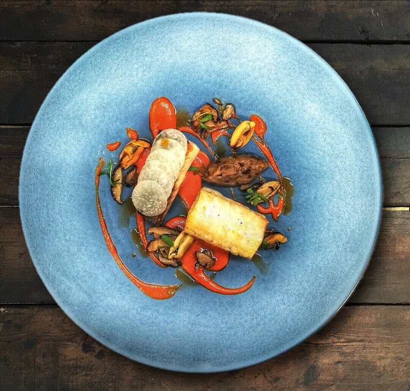 Sea bass, spice aubergine,red pepper, mussels, shiitake mushrooms by chef Onik Minasian, Ginger & Fred restaurant, Czech Republic 